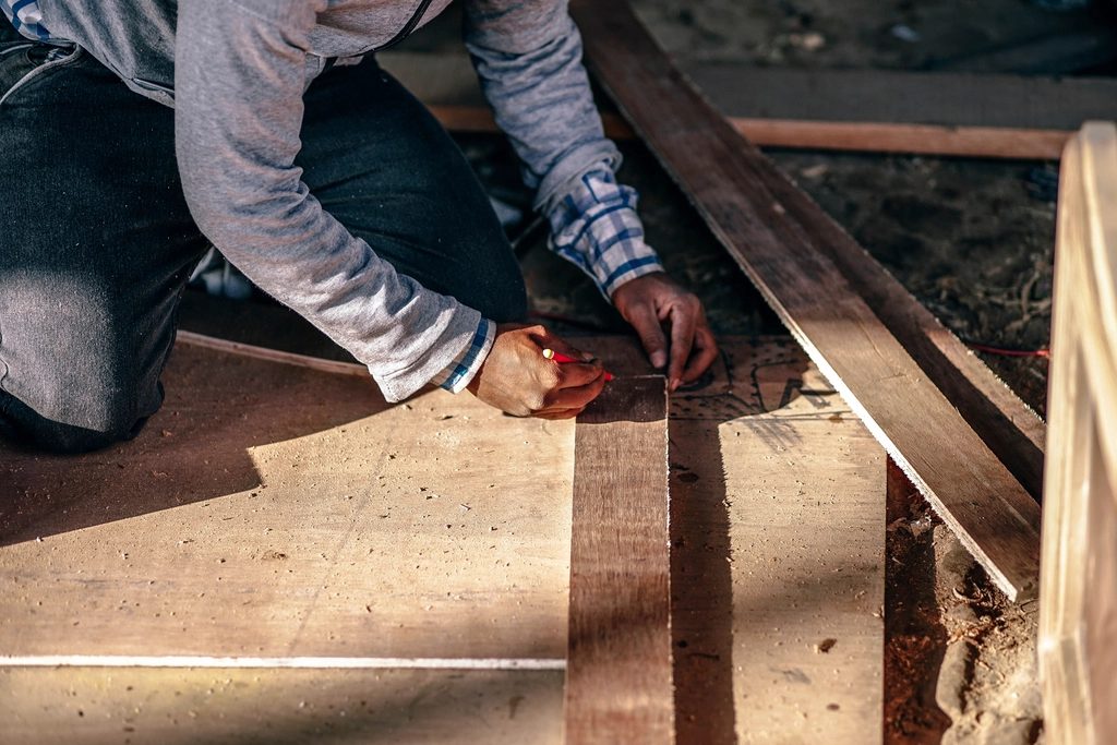 Cutting plank flooring during an installation