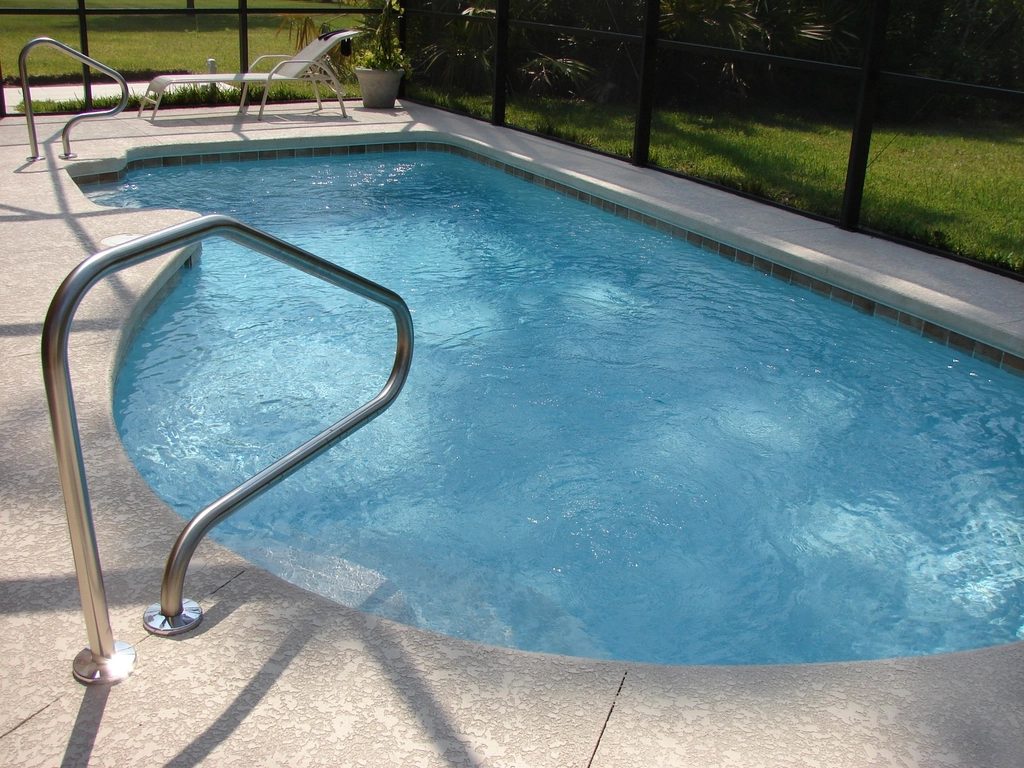 Pool steps and circulation returning to clear water