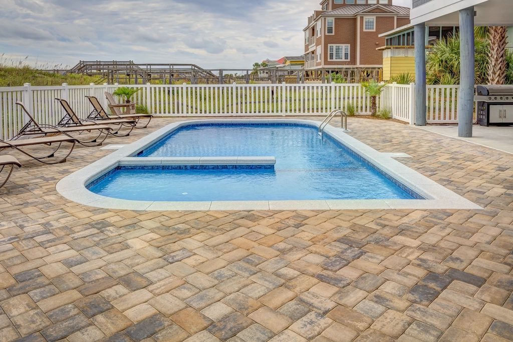 Pool deck cleaned by pressure washing